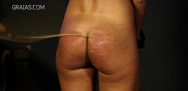 After brutal whipping both slaves are covered in marks